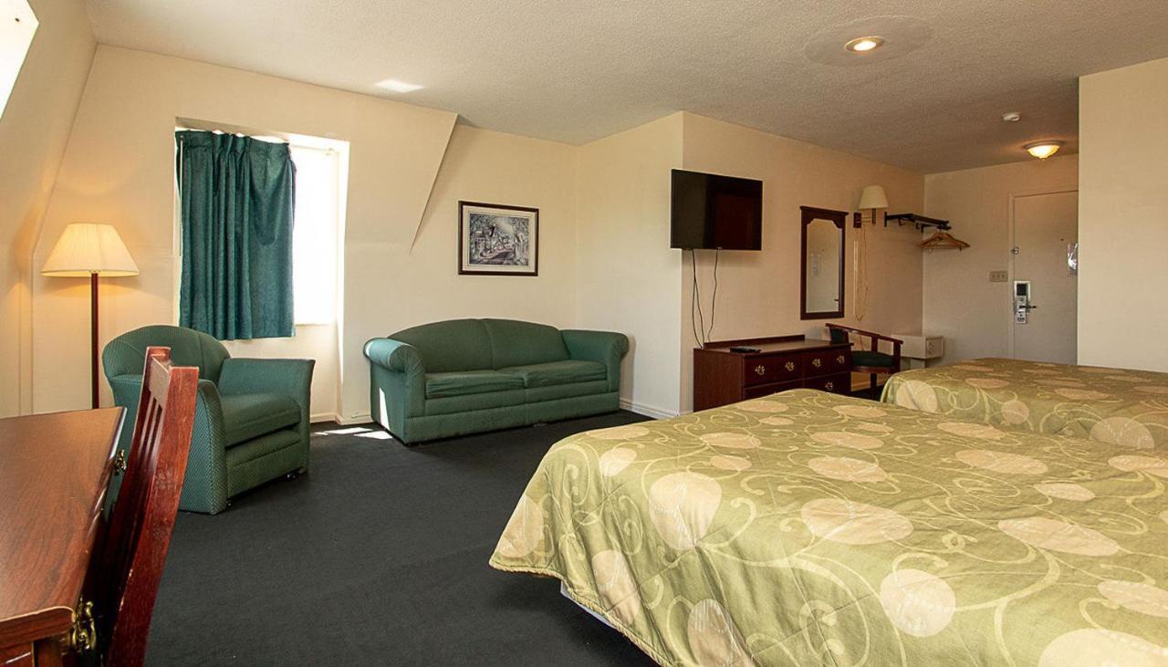 Country Squire Inn And Suites Coshocton Экстерьер фото